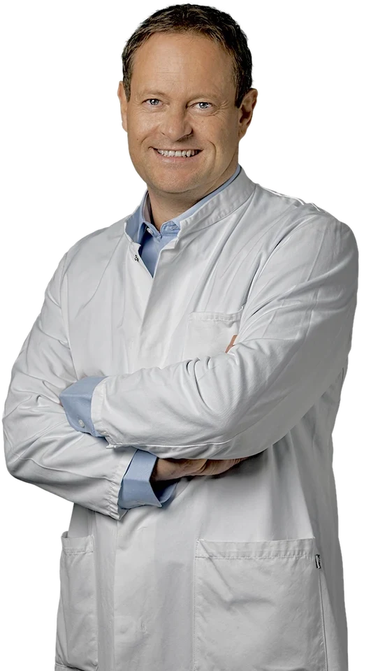 Prof. Karl Stoffel in a physician's coat